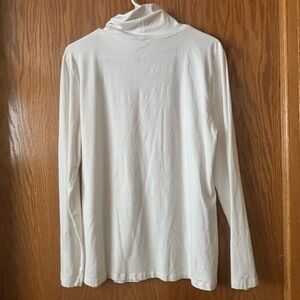 white cj banks turtle neck